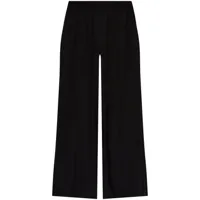 victoria beckham pantalon ample à motif monogrammé - noir